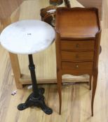 A marble top plant stand and side table