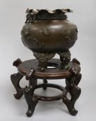 A Japanese bronze incense burner and stand