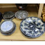 A collection of Art pottery plates and dishes, signed