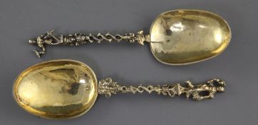 Two 18th/19th? century silver gilt apostle spoons, with spiral stems and rat tail bowls,