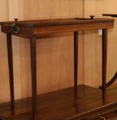 An Edwardian inlaid mahogany two handled tea tray, on a stand W.78cm