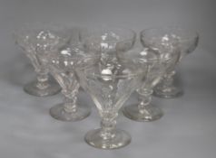 A set of six large late Victorian/early Edwardian panel-cut glass rummers