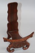 A Chinese pot and a carved wood stand pot height 17cm stand height 28cm