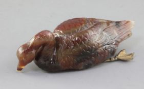 A late 19th / early 20th century carved agate model of a swan, with gilt metal feet, 4in.