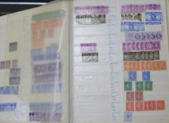 A box of world stamps in albums and stock books