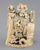 A Japanese ivory okimono of boys clambering on an elephant, Meiji period, the boys performing