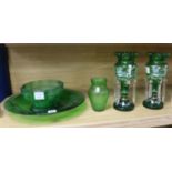 A pair of Victorian 'Mary Gregory' green glass lustre vases and three other pieces of green