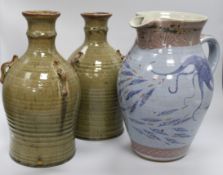 A Chris Patton Studio pottery earthenware jug and a pair of Michael Leach Yelland Pottery three-
