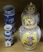 A pair of Dresden vases and covers and two Chinese blue and white vases