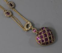 An early 20th century yellow metal, amethyst, rose cut diamond and rock crystal set heart shaped