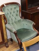 A Victorian buttoned-back armchair and a similar chair