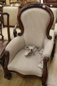 A Victorian style mahogany armchair