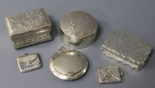 Two early 20th century silver stamp envelopes including enamel, an Edwardian snuff box, two others
