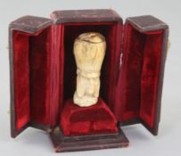 An early 19th century bone cane handle, carved with the head of an Orthodox priest, 2.5in., in