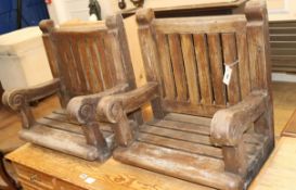A pair of scroll arm coachman's chairs, with no bases or legs W.55cm