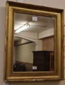 A gilt brass "picture" frame wall mirror W.52cm