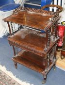 A Victorian rosewood three tier whatnot W.62cm