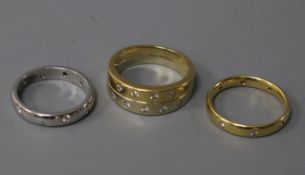 Two modern 18ct gold and gypsy set diamond rings and a white metal and diamond gypsy set diamond
