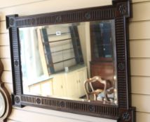 A mahogany framed wall mirror W.96cm