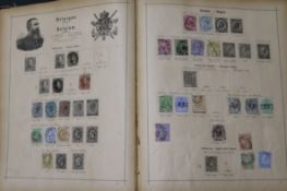 A box of world stamps in albums and stock books