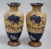 A pair of Doulton vases height 31cm