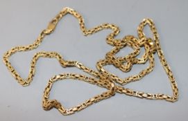 An 18ct gold fancy link chain, 64.5cm, 35.5 grams.
