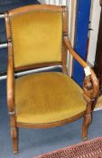 A French Empire mahogany scroll arm fauteuil