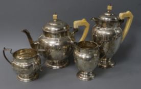 A stylish 1930's Art Deco silver four piece tea and coffee service, maker, RR, Birmingham 1932.