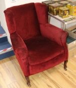 A velvet upholstered armchair