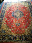 A Turkish carpet (worn) 330cm x 245cm