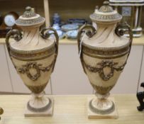 A pair of plaster urns height 57cm