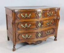 An 18th century French fruitwood serpentine commode, with two short and two long drawers, on