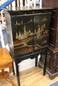 A Victorian japanned and mother-of-pearl inlaid papier mache collector's cabinet on stand, decorated