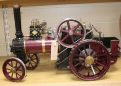 A live steam scale model traction engine, mid-20th century, unnamed, in maroon and black livery with