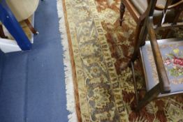 A Persian style tan ground carpet 306cm x 250cm