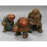 Three carved wooden trolls tallest 19cm