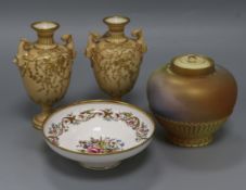 A small collection of Royal Worcester ceramics, including a pair of blush ivory twin-handled