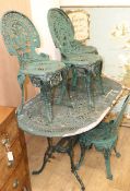 A garden table and four chairs W.138cm