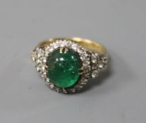 A yellow metal, cabochon emerald and white sapphire? cluster ring, size K.