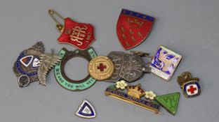 A collection of World War II military and other badges