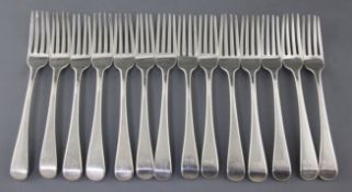 A set of fourteen George III silver Old English pattern table forks by Thomas Wallis II, with