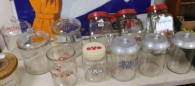 A collection of Edwardian and later Meredith & Drew biscuit, cheese straw and crisps jars (10 with
