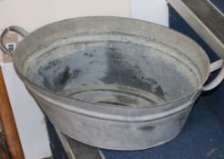 A Woolworth's galvanized two handled child's dolly tub