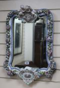 A Dresden flower encrusted wall mirror