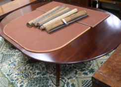 A George III style mahogany extending dining table W.167cm with leaf in