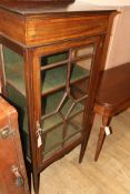 An Edwardian banded mahogany glazed bookcase W.61cm