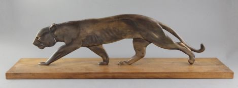 A French Art Deco bronze model of a prowling panther, on hardwood plinth, width 27.5in.