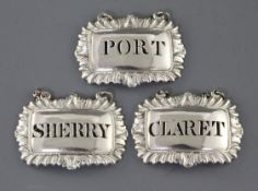 A set of three George III silver wine labels by George & John Cowie, Claret, Port & Sherry, of