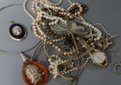 A 19th century gilt metal and enamel portrait pendant, two yellow metal bangles(a.f.) and a small