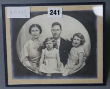 A portrait photograph of George V, the Queen Mother, and Princesses Elizabeth and Margaret by Marcus